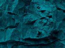  Green Blue Abstract Grunge Background. Toned Rock Texture. Texture Of The Mountains Closeup. The Combination Of Teal Color And Rough Rocky Shape. Volumetric Stone Background. 3D Effect.   