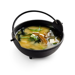 Traditional japanese miso soup on a white background