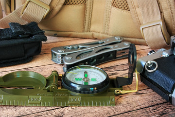 compass and multitool for hiking