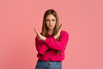 Wall Mural - Portrait of teenager girl showing prohibition sign