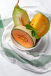 Fresh assortment melon with mint  on white