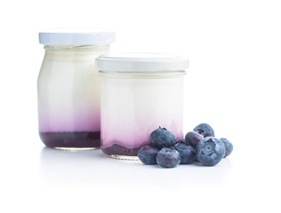 Wall Mural - White fruity yogurt in jar and blueberries