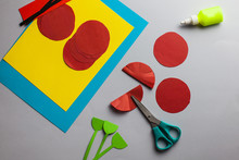 How To Make An Application From Paper Of Carnation Flowers. Red Carnations For Victory Day On May 9. Step-by-step Photo Instructions. Step 2. Fold The Red Circle In Half. Children's Art Project DIY.