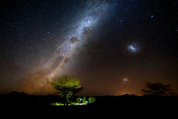 Wall Mural - photographer and traveler take photo beautiful starry night at alone tree in namibia. night landscap