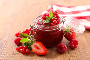 Wall Mural - berry fruit jam in jar and fresh fruits