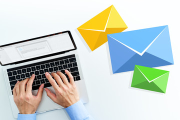 Aufkleber - Business man writing email on white table. Top view of using laptop. Three email icons.
