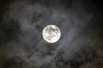 Wall Mural - the flower moon shining bright in the cloudy sky, 7/5/2020 , cornwall, uk