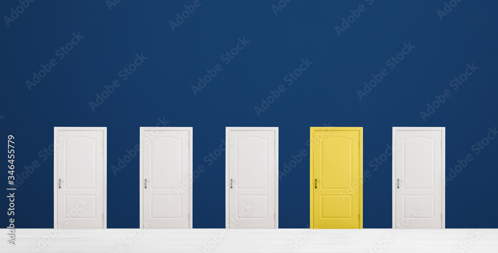 Yellow door among white ones in room. Concept of choice - obrazy, fototapety, plakaty 