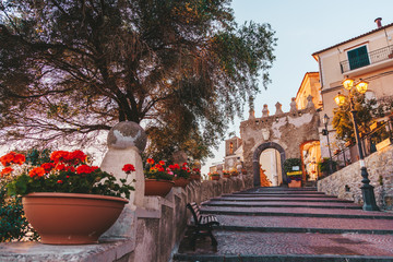 Old door and staircase of the city of Agropoli in Cilento, Campania, Italy.