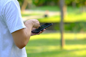 Poster - Young man using a smartphone working in home and Online shopping, freelance, online learning, worked at home office concept
