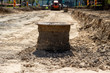 © Alex  - Sewer well on the road reconstruction  site, sewerage, communication,