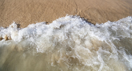 Wall Mural - Sand washed with water from the sea.