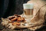 Fototapeta Na sufit - Latte Macchiato with cookies on the wooden