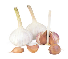 A heads of garlic with slices. Cloves of garlic. Includes clipping path.