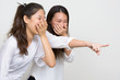 © Ranta Images - Two young beautiful Asian women as friends laughing together
