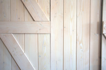 Wall Mural - Light wood barn doors background texture modern interior close-up