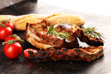 Wall Mural - Grilled spare ribs for a tasty bbq meat with hot spicy barbecue sauce