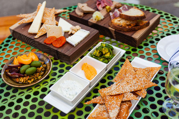 Wall Mural - appetizer board with cheese and bread