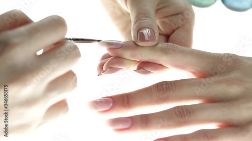 Application of nail polish on nails Lerretsbilde