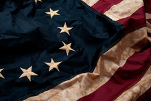 Revolutionary War, Patriotism And Birth Of The United Sates Of America Concept With Closeup On The Original 13 Star American Flag Known As The Betsy Ross