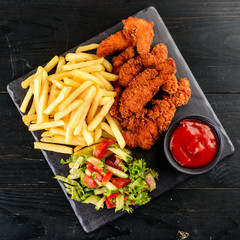 Poster - set of chicken nuggets, salad and french fries