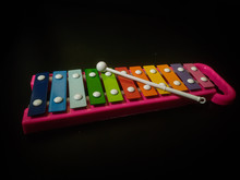 Colorful Xylophone Instrument For Young Children Isolated On Black Background