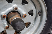 Trailer Grease Cap On Rusted Tire Frame