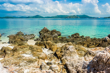 Sticker - Tropical island rock on the beach with blue sky. Koh kham pattaya thailand.