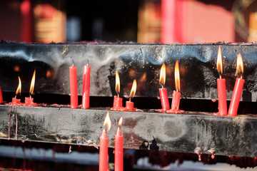 Wall Mural - red candles in Yuantong Temple, Buddhist temple in Kunming. landmark and popular for tourists attractions in Kunming, Yunnan, China. Asia travel concept