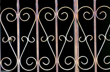 curved forged metal gate detail