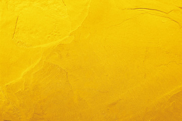 gold slate stone background or texture. gold stone