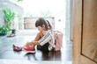 © Odua Images - little girl put her shoes on by herself before going to school