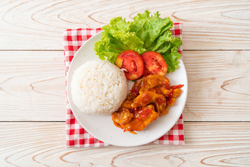 Fried fish topped by 3 flavors chili sauce with rice