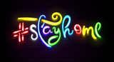 Fototapeta Młodzieżowe - Neon light shiny vector phrases on night brick background