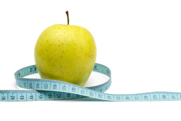 apple with old blue measuring tape on a white background