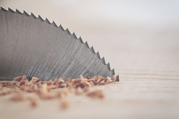 Circular saw cutting wooden plank. Circular milling in oak block.