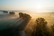 © Westend61 - Germany, Bavaria, Drone view of countryside landscape at foggy sunrise