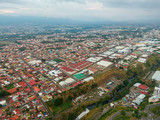 Fototapeta Miasto - Impressive aerial view of the city of San Jose with view to the Sabana park 