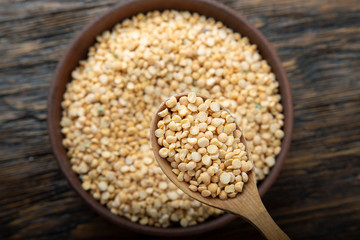 Canvas Print - dry yellow peas in a plate