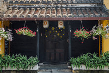Traditional House With Brown Doors And Chinese Lanterns In Hoi An Old Town. World Heritage Site. Vietnam