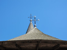 An Old Church Wooden Rooftop With Two Crosses, Romania