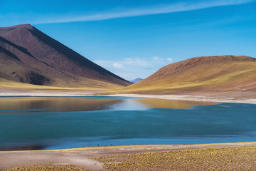 Wall Mural - Miniques Lake (Spanish: Laguna Miniques), a remote high altitude lake located in the Atacama Desert in northern Chile, South America.