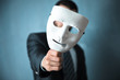 © Daniel - man hand white mask