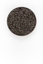 Sunflowers Seeds In Round Bowl On White Background, Top View