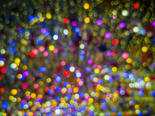 Wall Mural - Colorful abstract bokeh lights background.Multi color bokeh background.