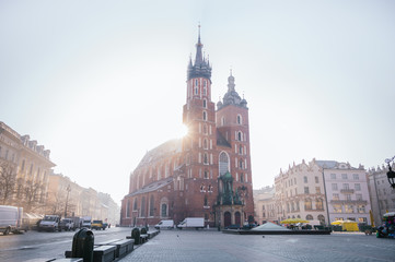 Wall Mural - Krakow Old Town with view of St. Mary's Basilica during sunrise