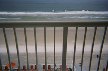 High Angle View Of Railing Against Beach