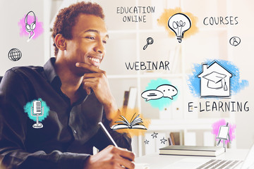 Smiling African man writing, e learning sketch