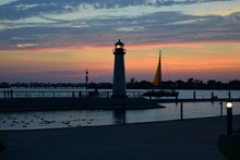 Lighthouse In Lake Ray Hubbard Against Sky During Sunset