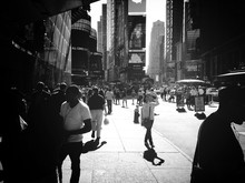 Pedestrians Walking In Times Square